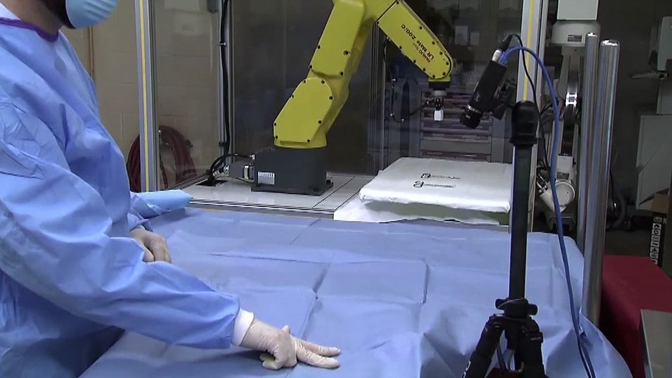 Researchers are developing a system that would allow surgeons to control both computers and robotic scrub nurses via hand gestures (Photo: Purdue University)