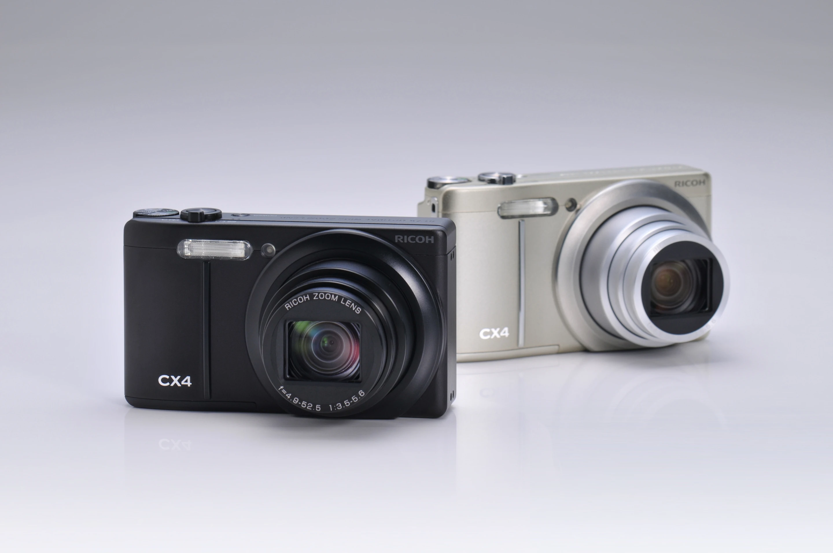 The CX4 in black and silver, from the front with the lens open