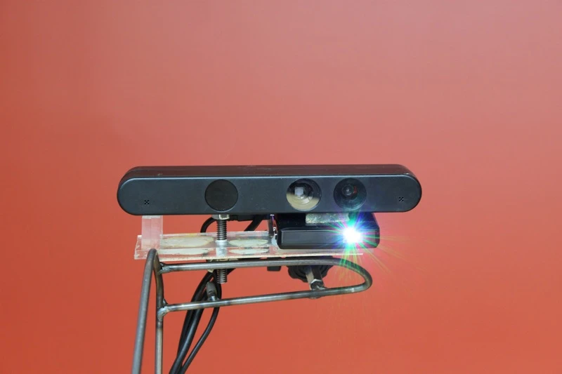 The OmniTouch wearable interface projector