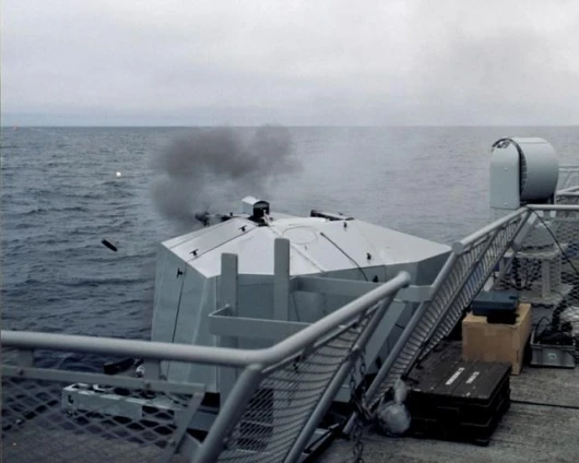 A wall of metal emanates from the Millenium Gun