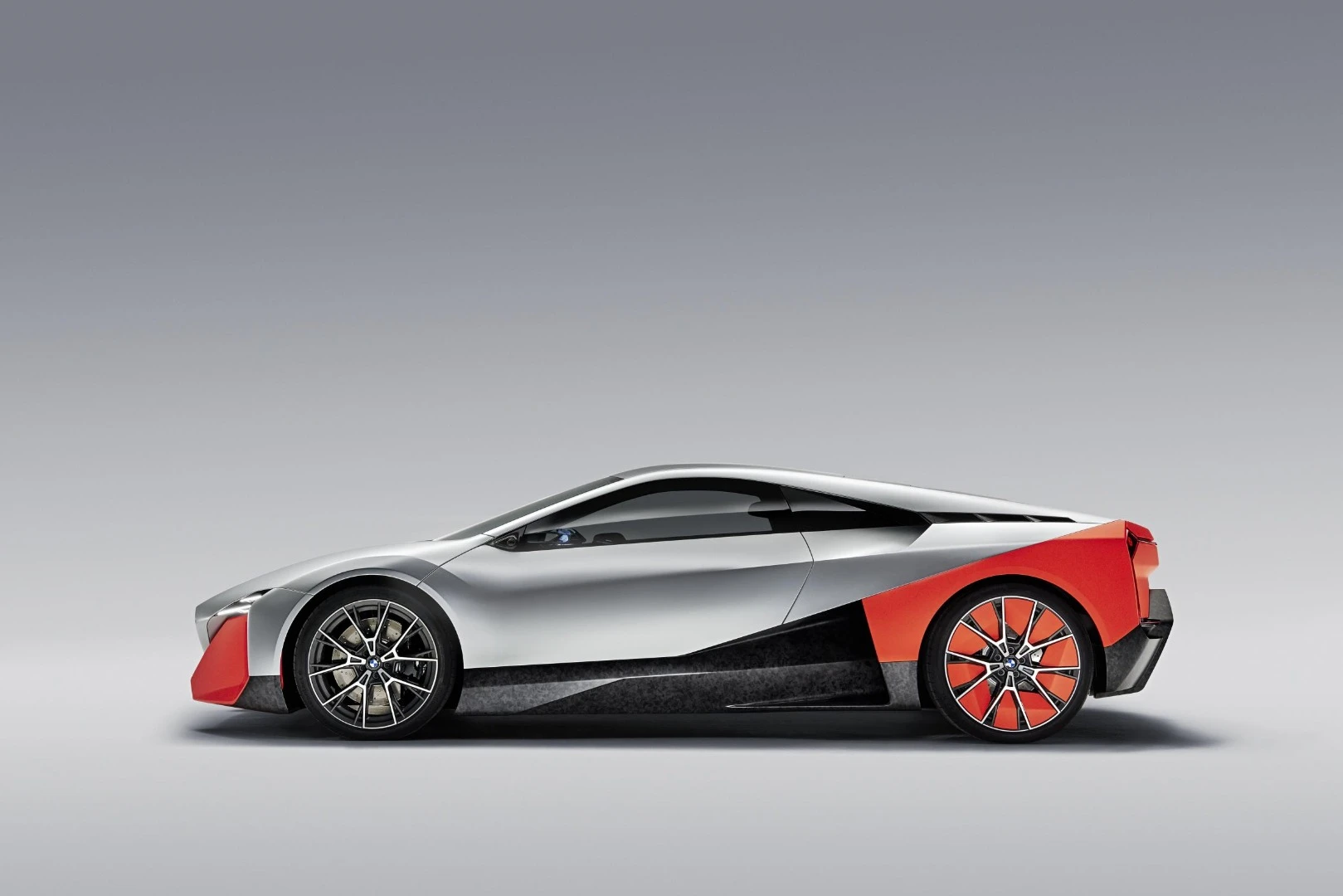 The profile was clearly inspired by the i8 but is lower and more dramatic
