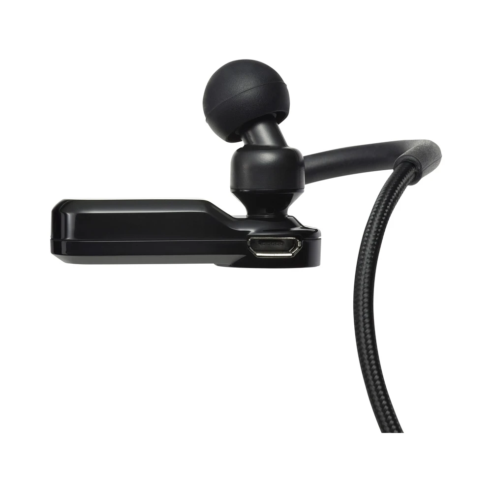 The right earpiece housing sports a micro USB port for charging the integrated Li-Pol battery