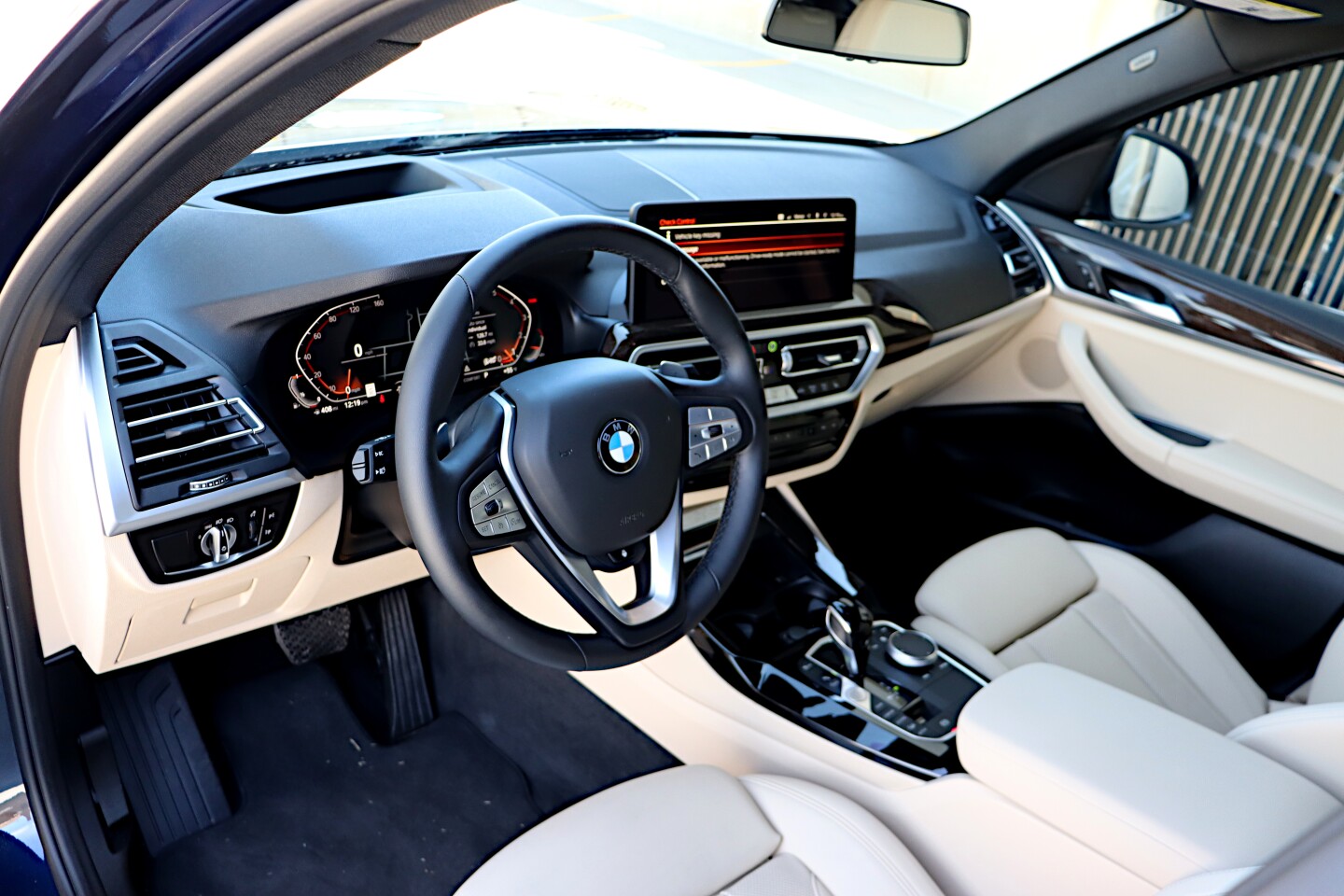 The interior of the X3 is comfortable and well appointed, with the typical BMW flair for minimalism and luxury