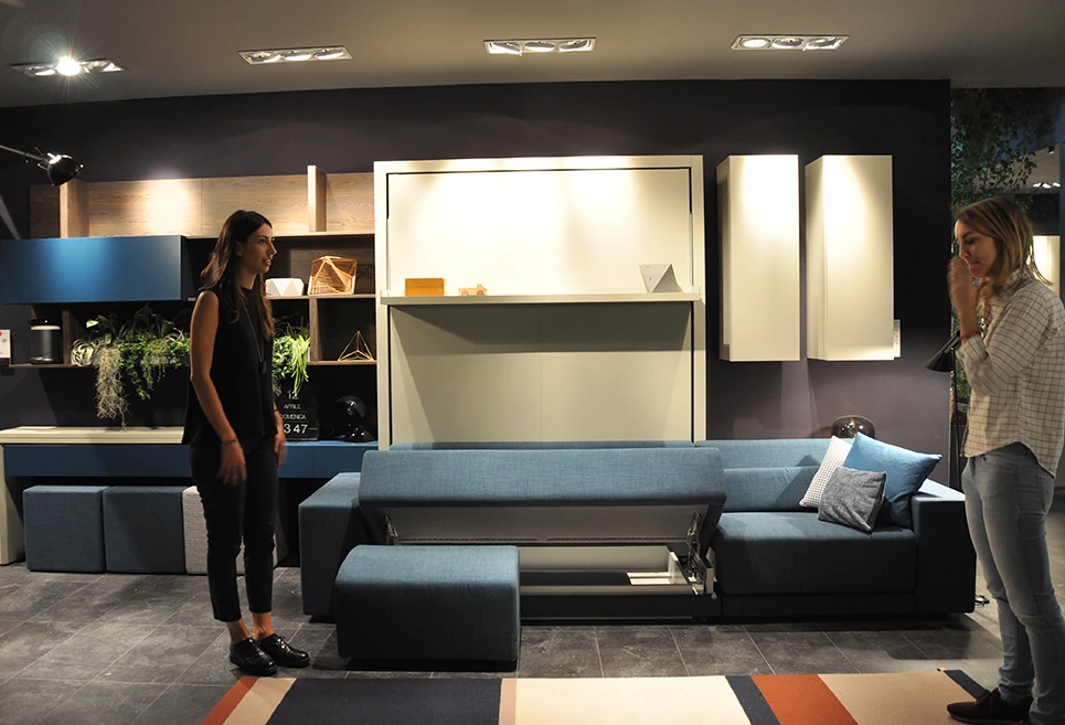 The sofa features a storage case for the back rest cushions