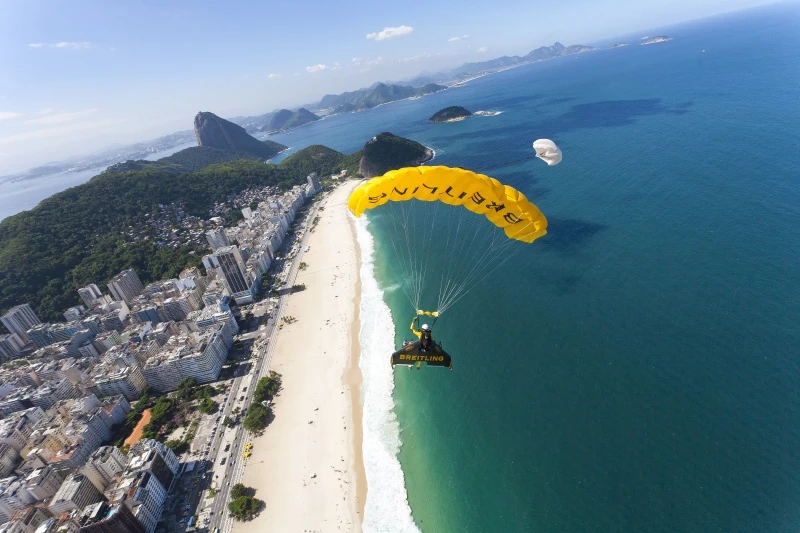 Jetman heads for a beach landing in Rio (Copyright: Bruno Brokken/Breitling SA, photo via AP Images)