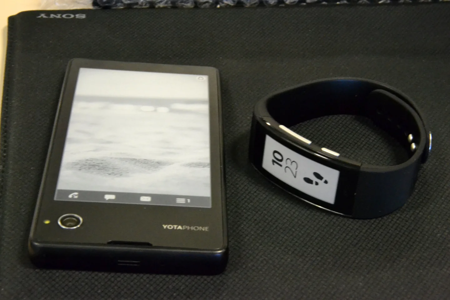 The YotaPhone (left) and Sony's new SmartBand Talk (right) (Photo: Paul Ridden/Gizmag)