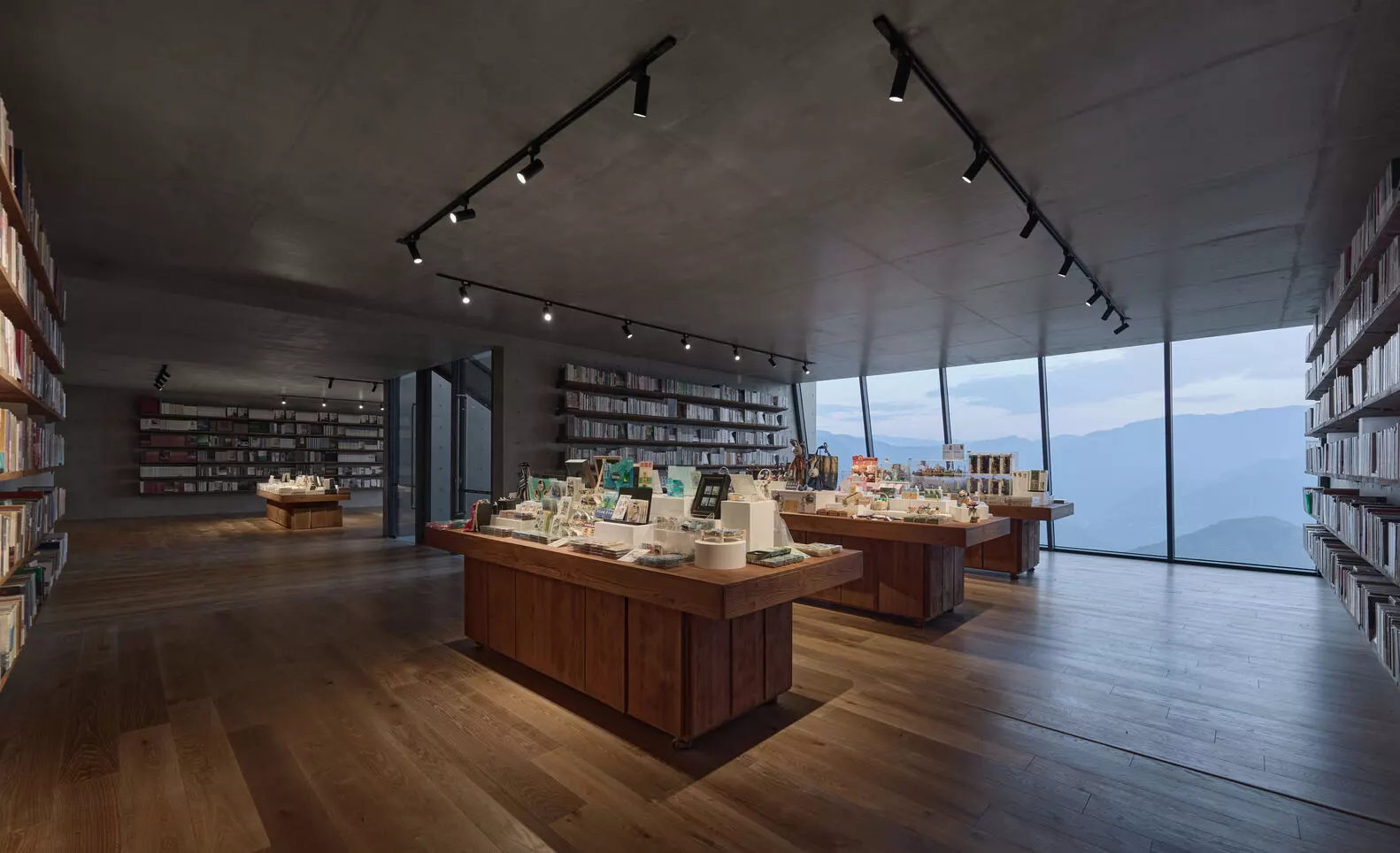 Exploring books surrounded by vistas of untouched mountains and river