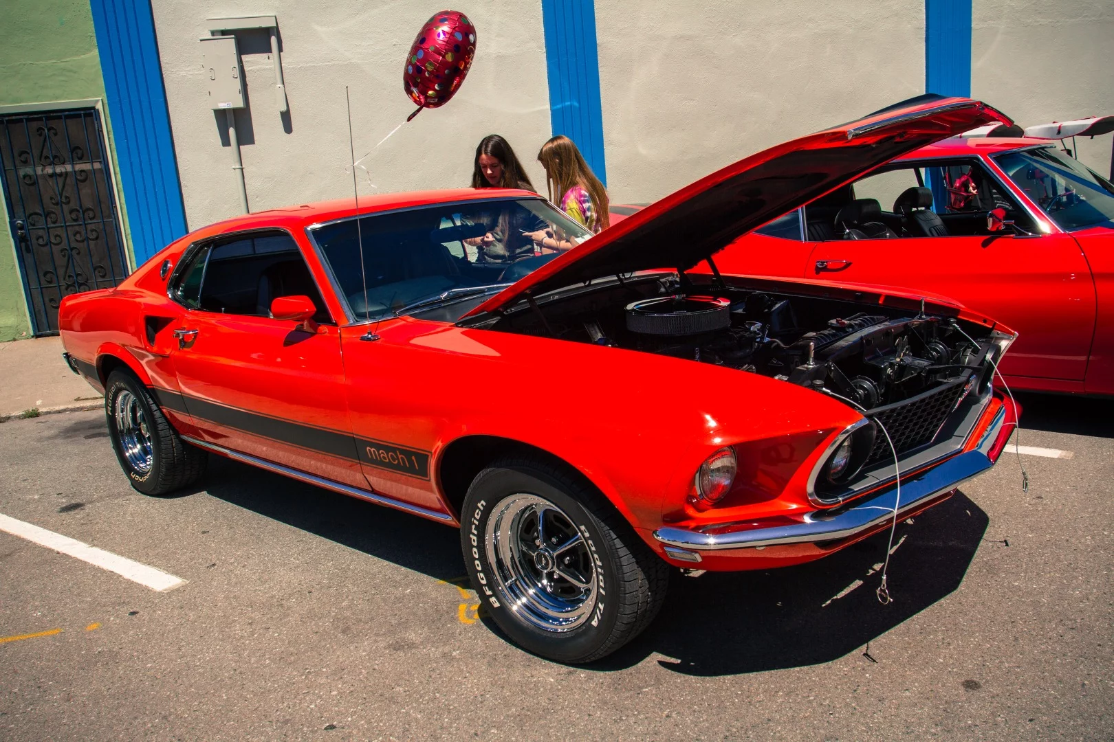 1969 Ford Mustang Mach 1. The Mach 1 designation is the performance oriented package. Options for trim, drive train, transmissions, and even suspension made the Mach 1 a dream for gear-heads