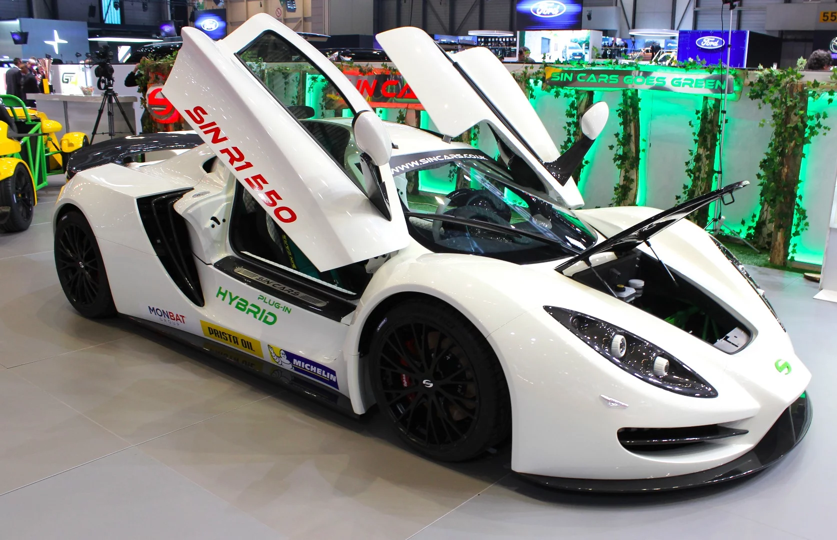 SIN also debuts the 570-hp plug-in hybrid version of its R1 550 sports car. It offers 37 miles (60 km) of all-electric city driving, then opens up on highways when the 450-hp 6.2-liter V8 kicks in