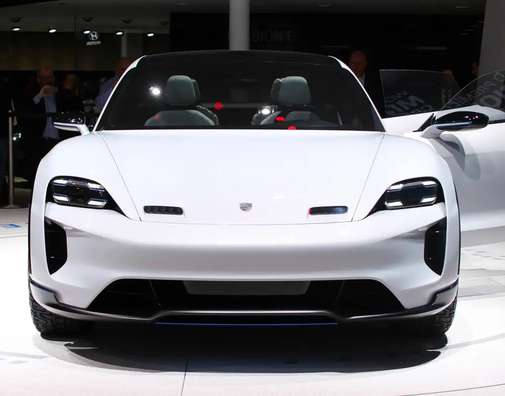 Porsche puts its Mission E face on a larger, more muscular body