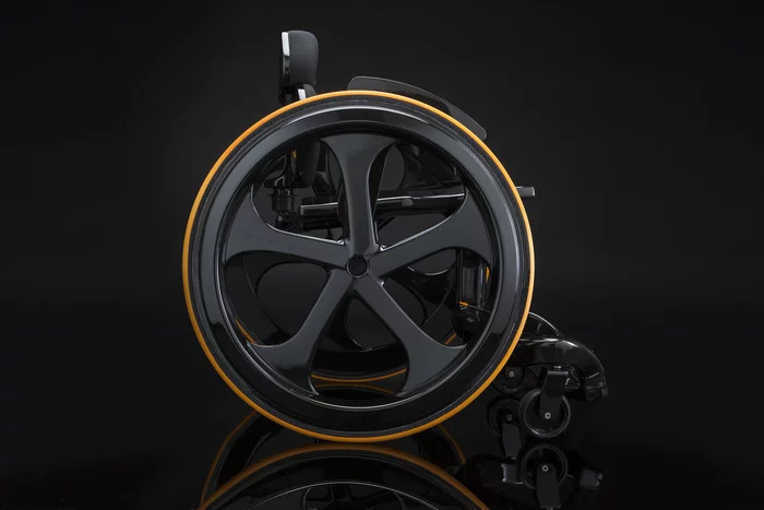 The wheelchair weighs 8.5 kg (18.7 lb) and is built almost entirely from carbon fiber