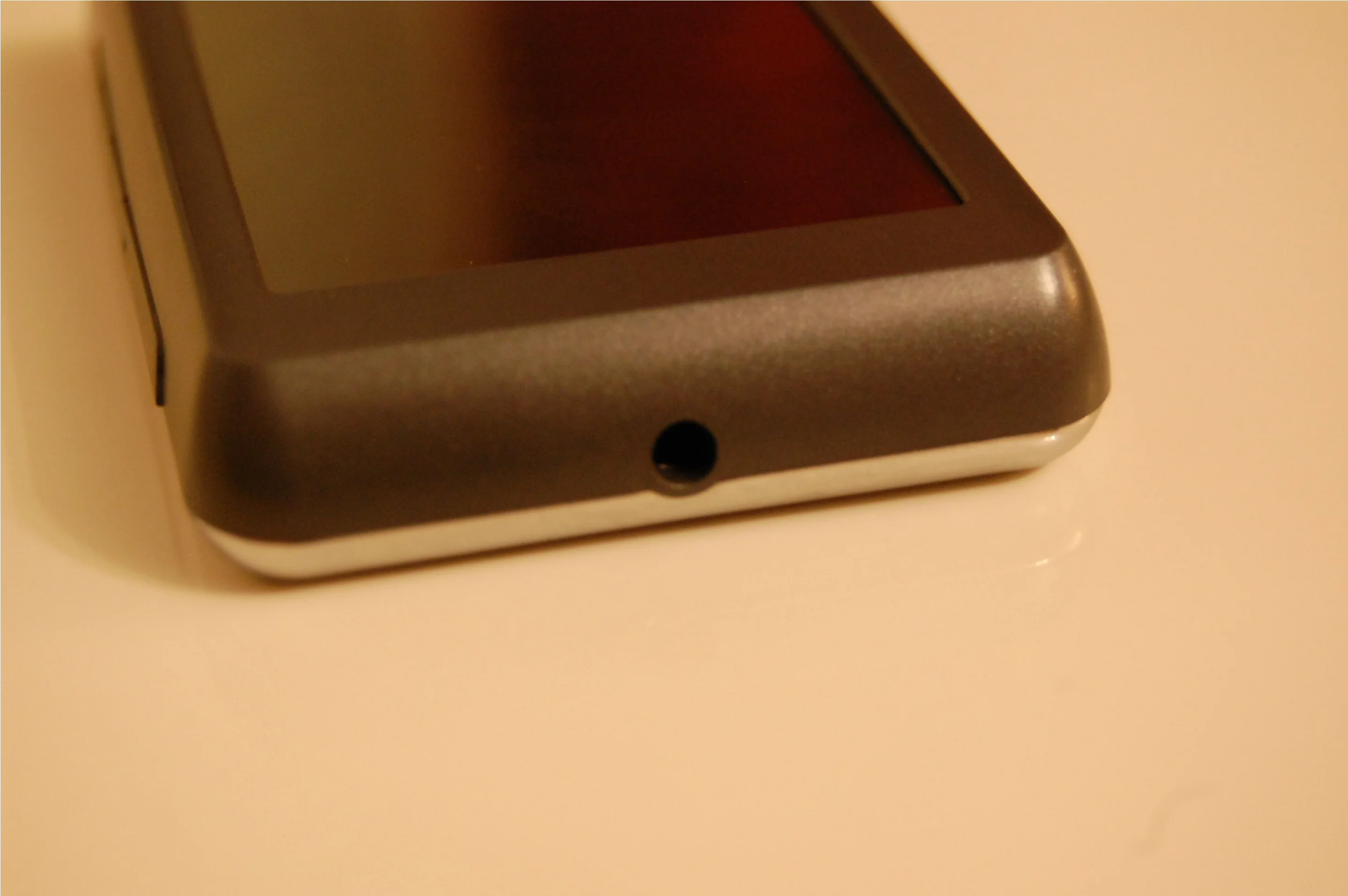 On the left is a 3.5mm audio out jack, and the bottom edge is free of any buttons, ports or other distractions