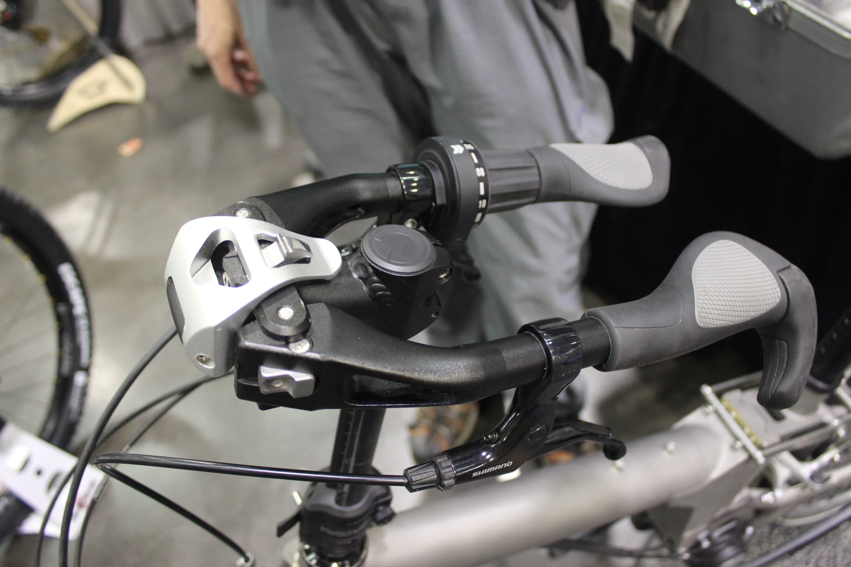 The newest version of the Alpaca Bike offers this unique handlebar-folding feature, for packing it up when travelling