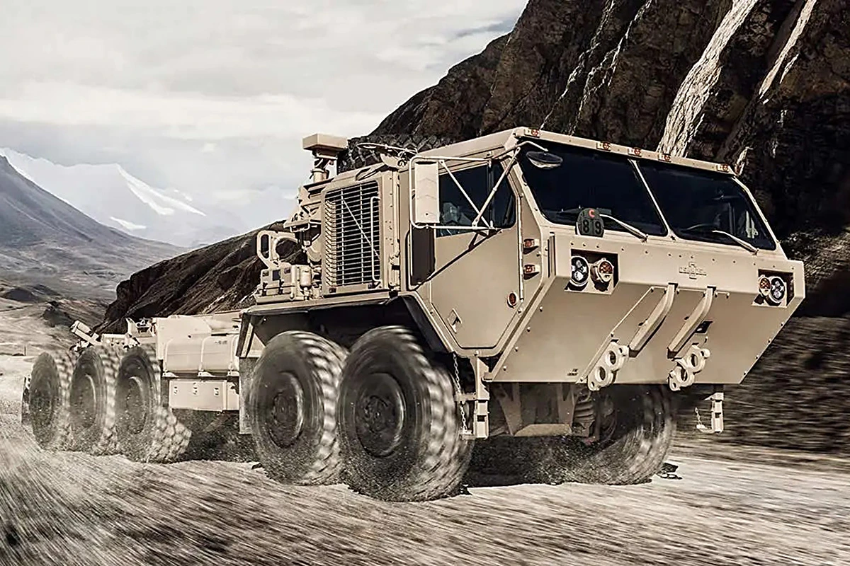 Oshkosh's PLS heavy tactical vehicles are designed to carry large payloads and keep up with tracked counterpartsacross virtually any terrain