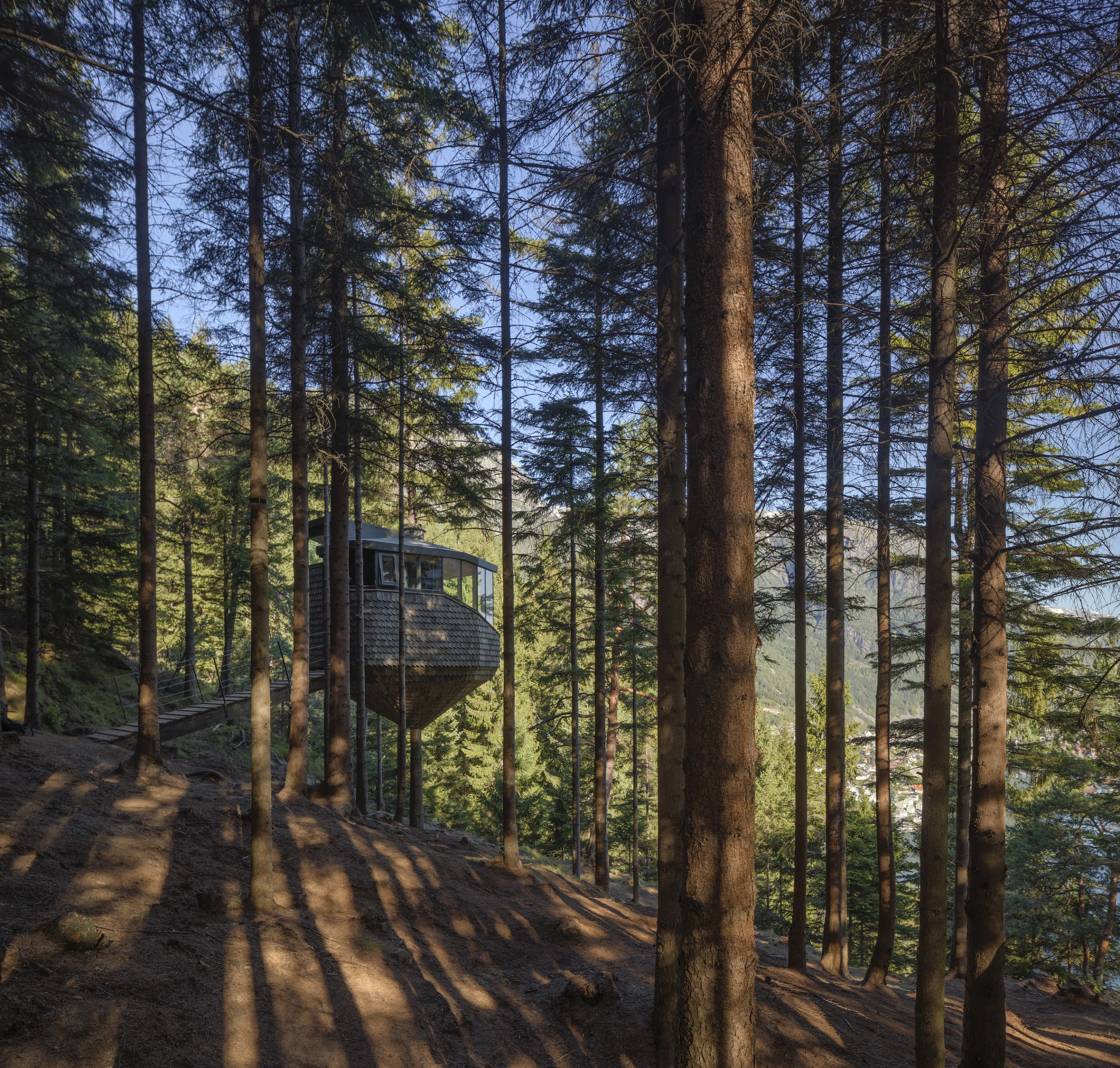 "The steep forested hillsides around the Hardangerfjord above Odda, is the location of two Woodnest treehouses," says Helen & Hard