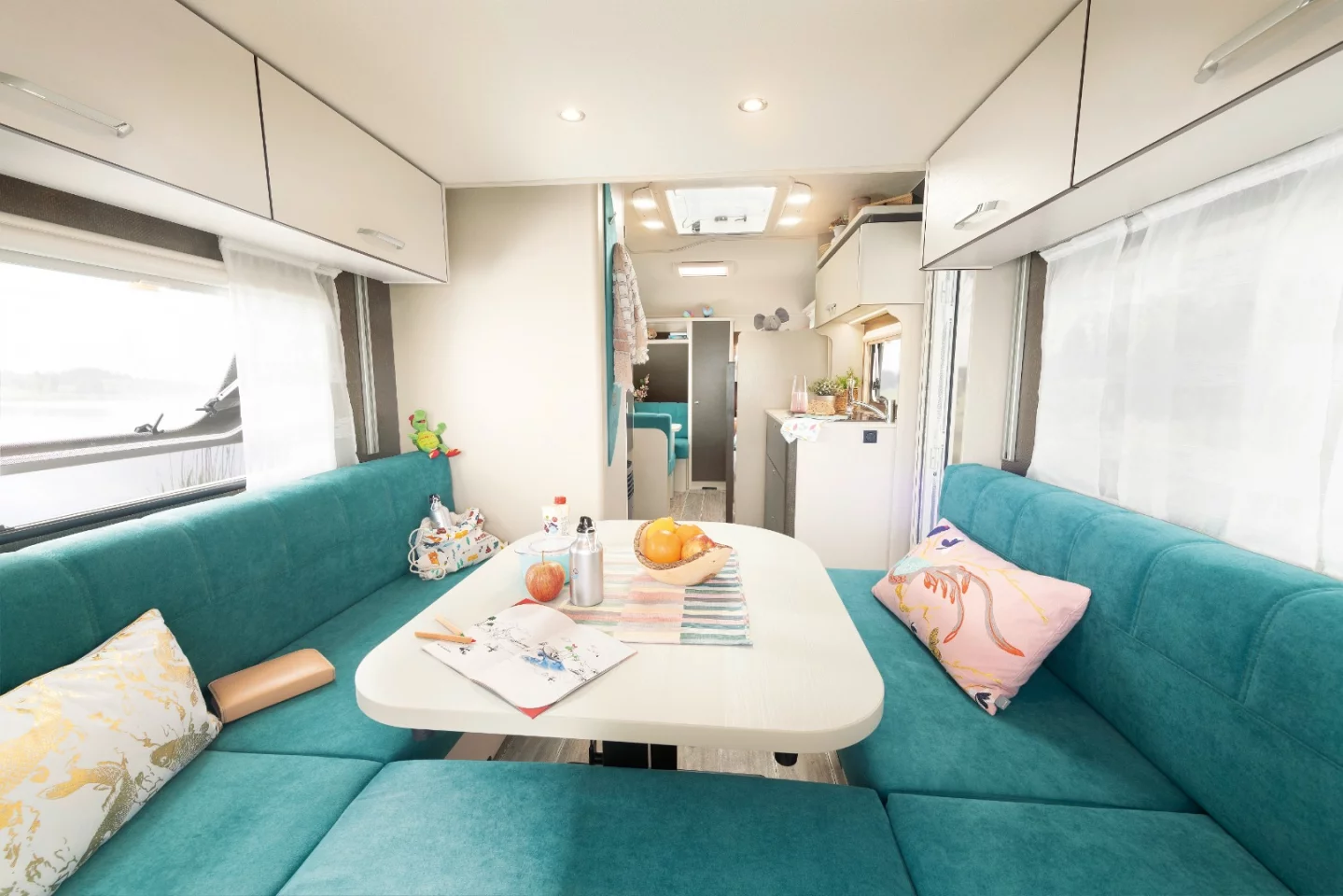 The rear of Dethleffs' C'Go Up is dedicated to the convertible dinette set and a drop-down upper bed
