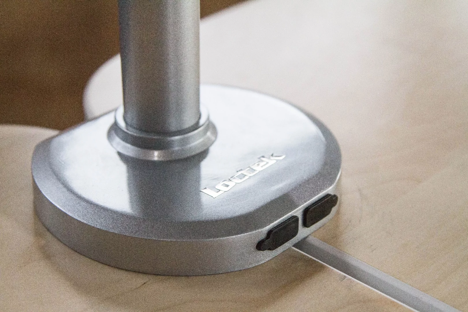 The base unit can be attached with a clamp, or using a screw-in plate