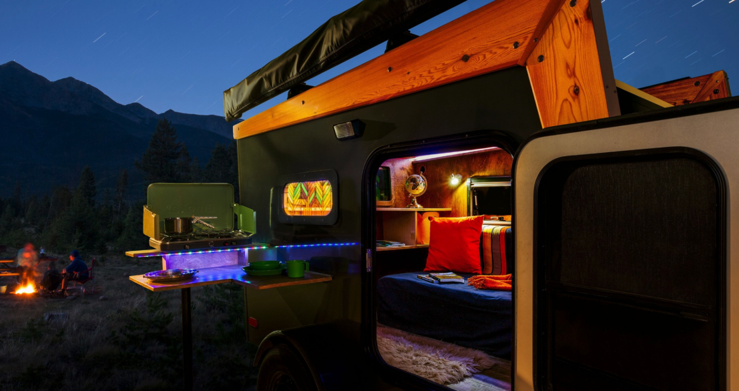 The Skyview camper doesn't include a full-blown kitchen but does come with attachable outdoor tables and a dual-burner stove