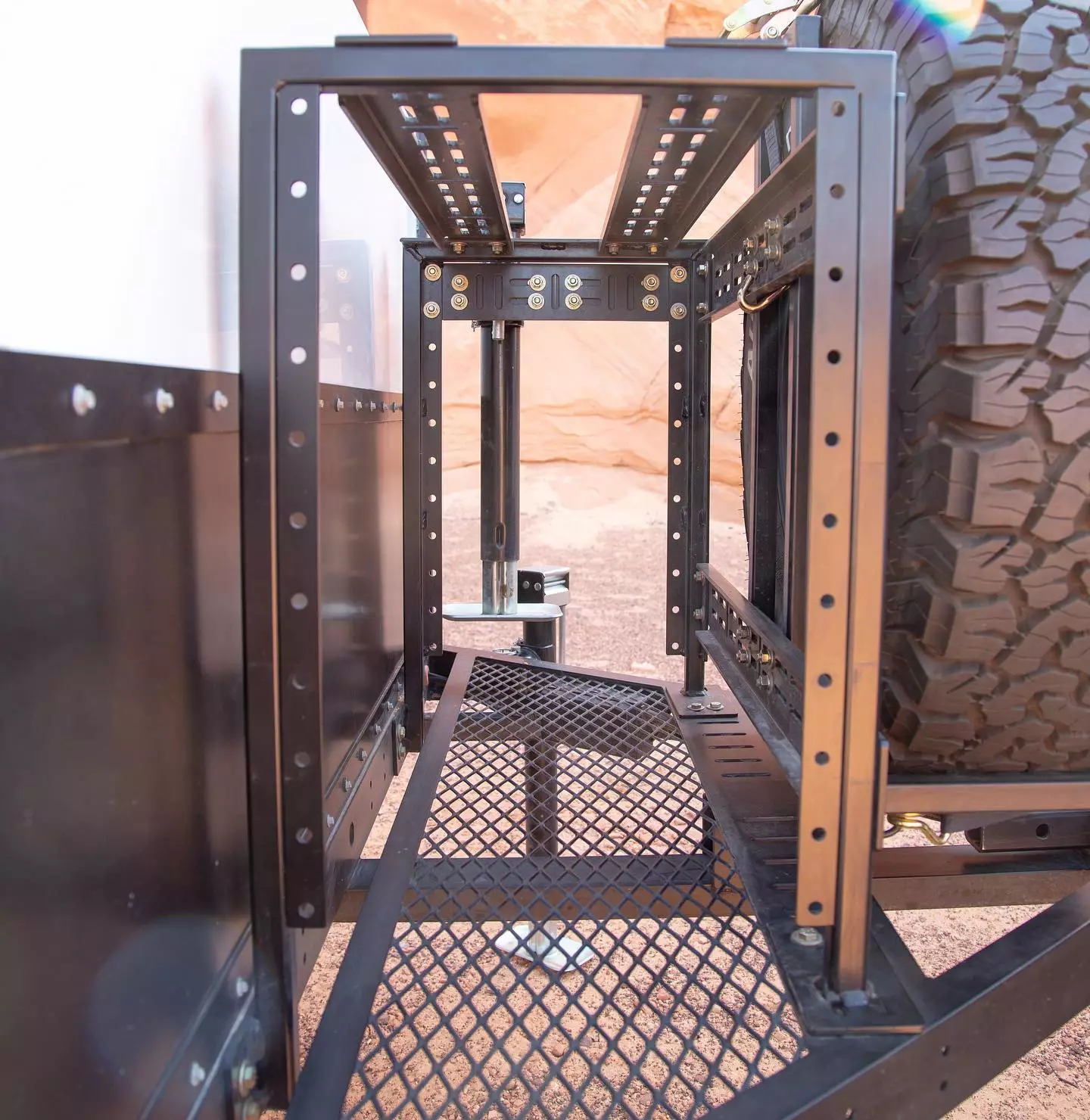 One of Zion's primary accessories, the Front Accessory System provides loading and mounting space for a variety of common equipment, including a spare tire