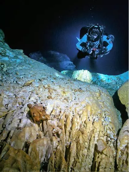 A diver spots a human skull inside Hoyo Negro