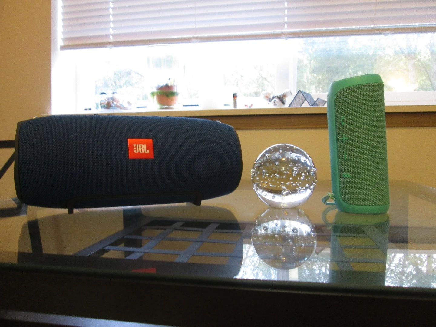 The Xtreme and Flip3 are portable Bluetooth speakers that don't mind getting their feet wet