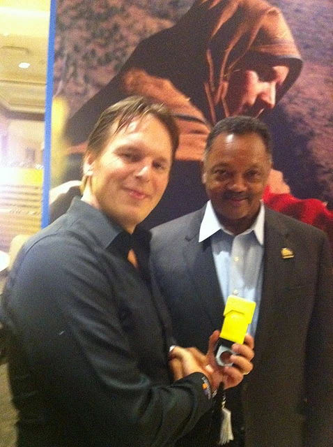 WakaWaka founder Camille van Gestel with Rev. Jesse Jackson