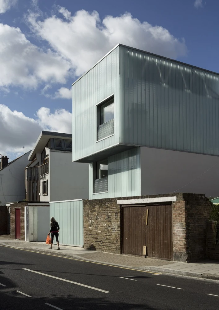 Slip House, by UK-based Carl Turner Architects, fits neatly between a row of terraced houses in Brixton, London