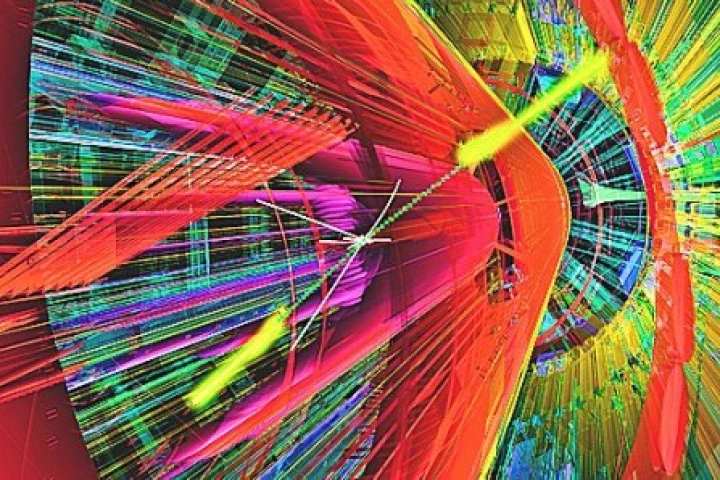 Artist's impression of a proton-proton collision producing a pair of gamma rays (yellow) in the ATLAS detector (Image: CERN)