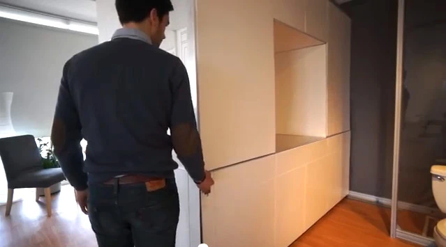 Touch controlled surfaces allow the CityHome unit to move back and forth a few feet, thus freeing up space in either the bathroom area or living room