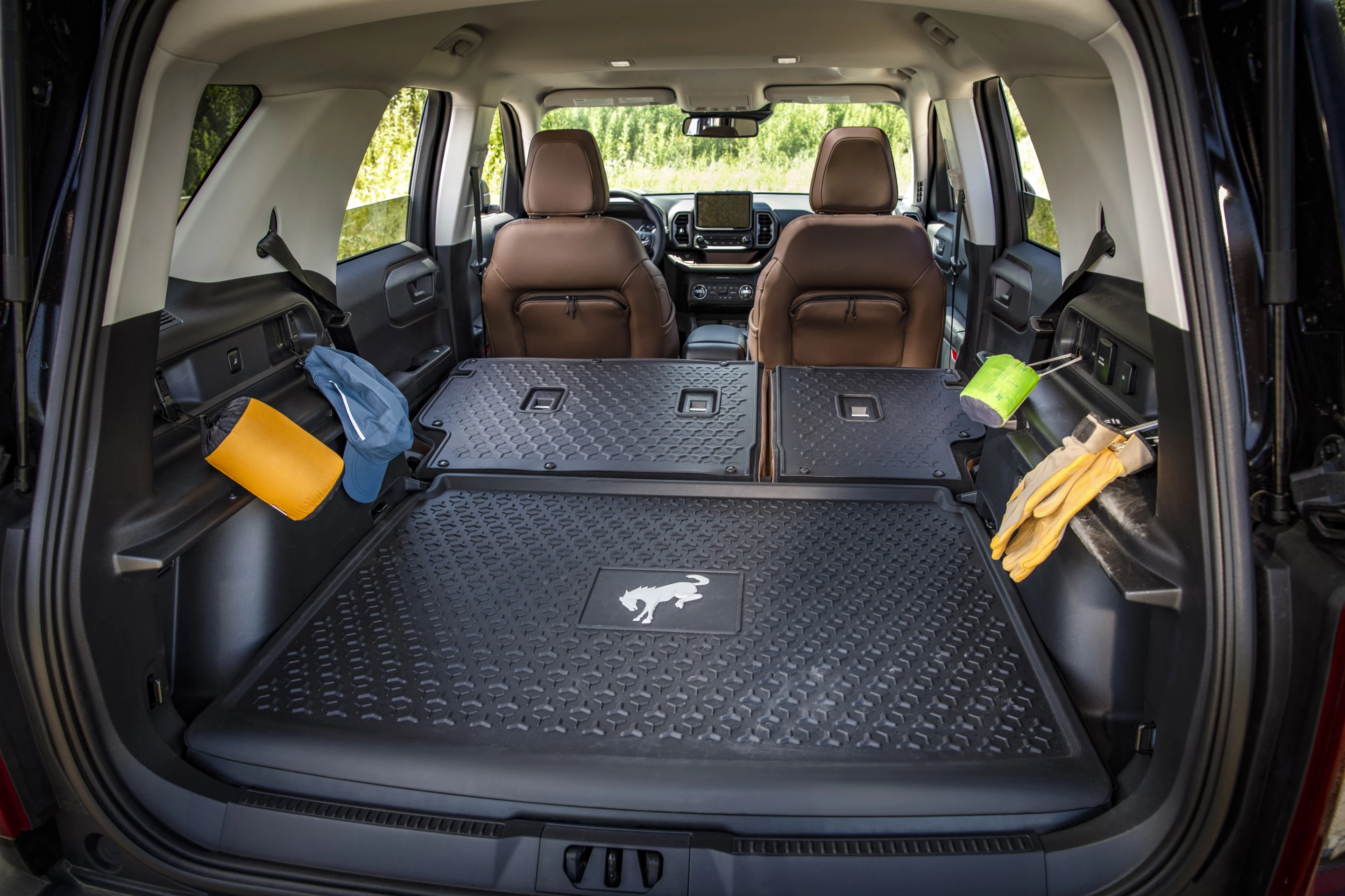 The Bronco Sport's washable rubber flooring and seat backs and carabiner hooks are sure to prove helpful to campers
