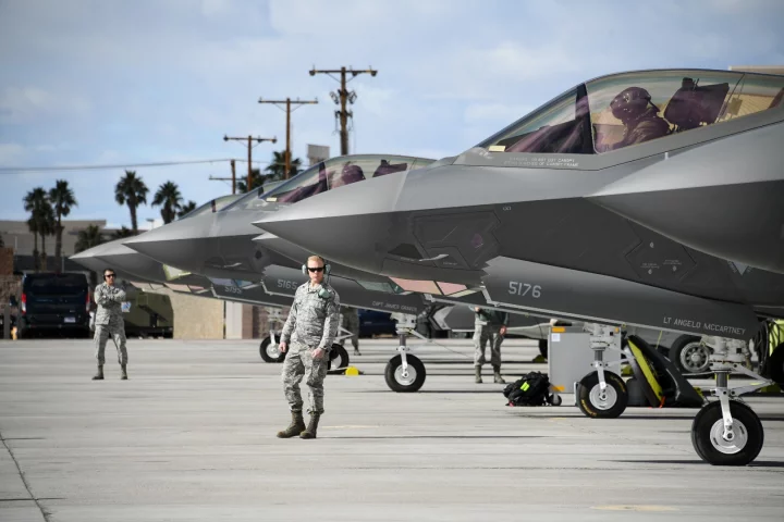 Crew chiefs assigned to the 4th Aircraft Maintenance Unit prepare to launch F-35A Lightning II fighter jets during Red Flag 19-1