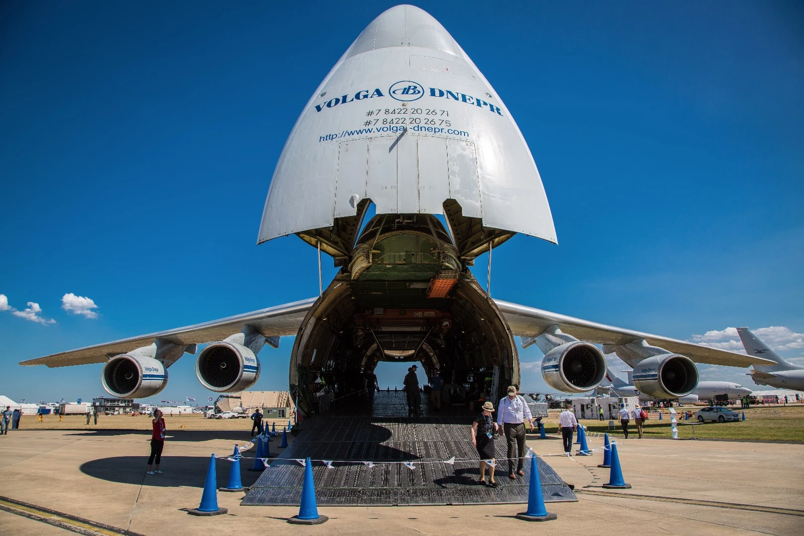 With the head flipped up and the tail open, the Antonov 124-100 is an open tube