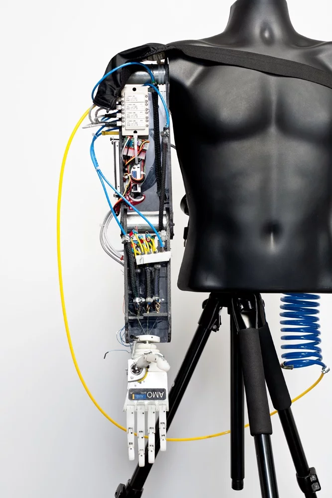 The AMO Arm is controlled by its wearerâ€™s brain signals, and powered by compressed air