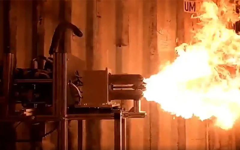 Test firing the AS-1 LOX/kerosene linear aerospike rocket engine in a closed environment