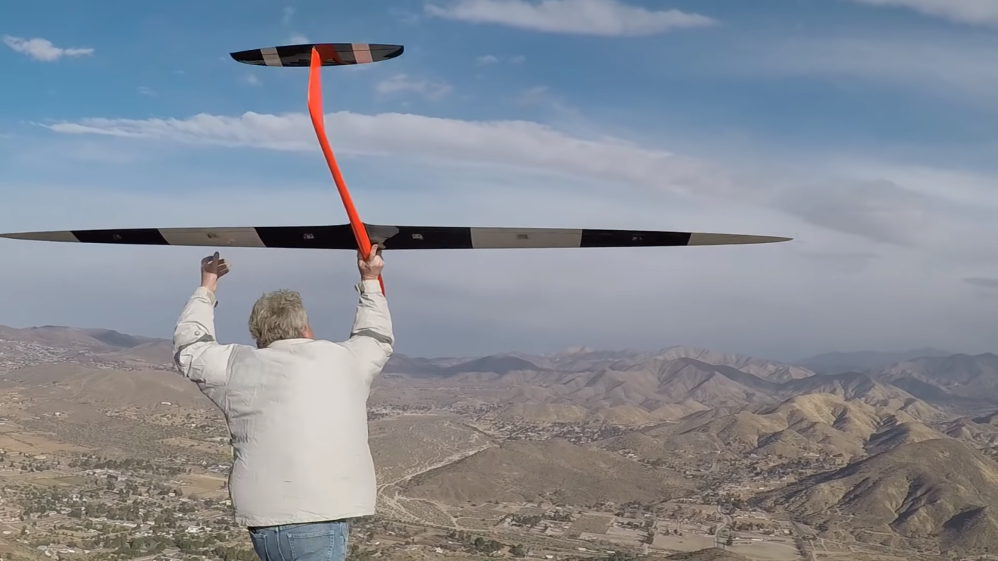Previous world record holder Bruce Tebo launches the DSKinetics Transonic DP glider off Parker Mountain, California, with dynamic soaring expert Spencer Lisenby at the sticks. Tebo recorded a radar-measured 548-mph world record peak speed.