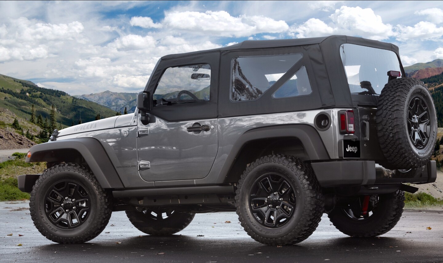 The soft top now uses plastic rails that snap into place on the roll bars, eliminating the yoga-inspired engineering required for installation of the soft tops of old