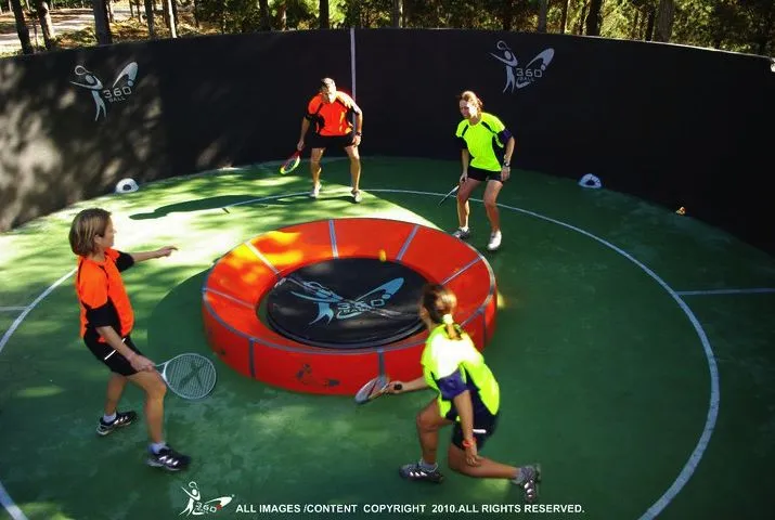 In the new racquet game of 360ball, players hit a ball into a central concave dish, trying to rebound it out of the reach of their opponents
