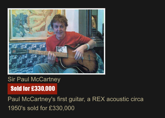 Screen clip from Cooper Owen Music Media Auctions showing Paul McCartney with the guitar that started him on the path to becoming the most successful recording artist of all-time. This Rex acoustic was the first guitar Paul McCartney ever held. It was also the guitar on which he learned his first chords. It sold for $615,203 (£330,000) at a Cooper Owen auction on 28 July, 2006