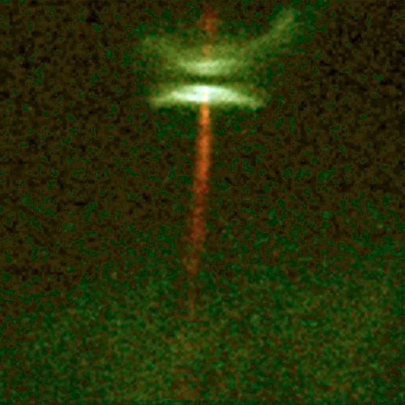 View of protostar HH 30, showing a clear protostellar disk and well focused jets of gas being emitted along the axis of rotation of the disk (Photo: HubbleSite.org)