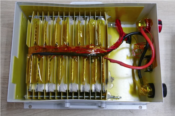 A flat pouch cell is in development that could allow these power capacitors to squeeze into less than half the space