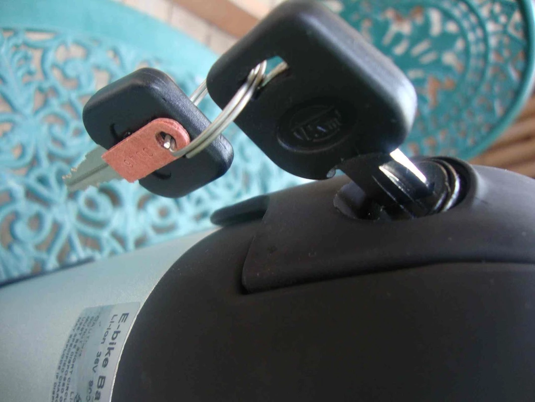 The battery locks to the scooter