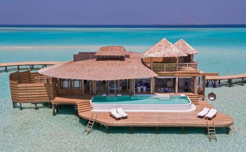 There will be 24 water villas and one island villa when the resort opens, with additional island villas expected to be added next year