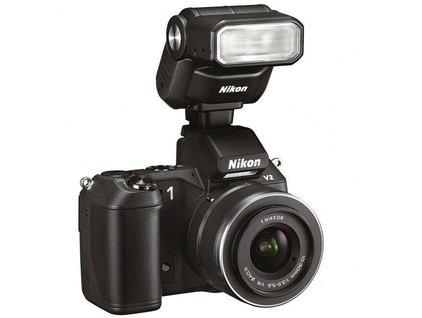 The Nikon SB-N7 speedlight, a compact and lightweight flash unit with a 120 degree tilting head