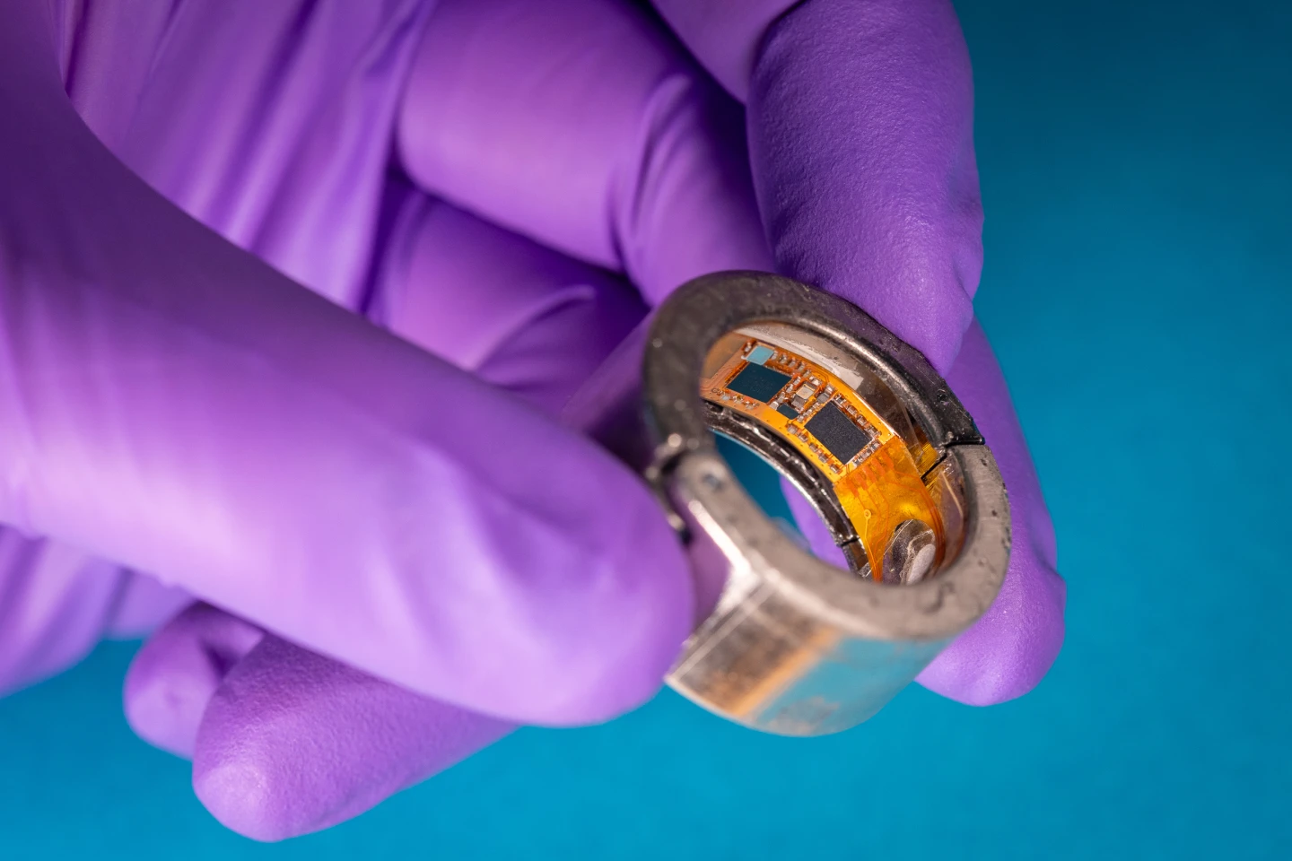 One half of the ring contains the flexible electronics, which consist of the battery and printed circuit board