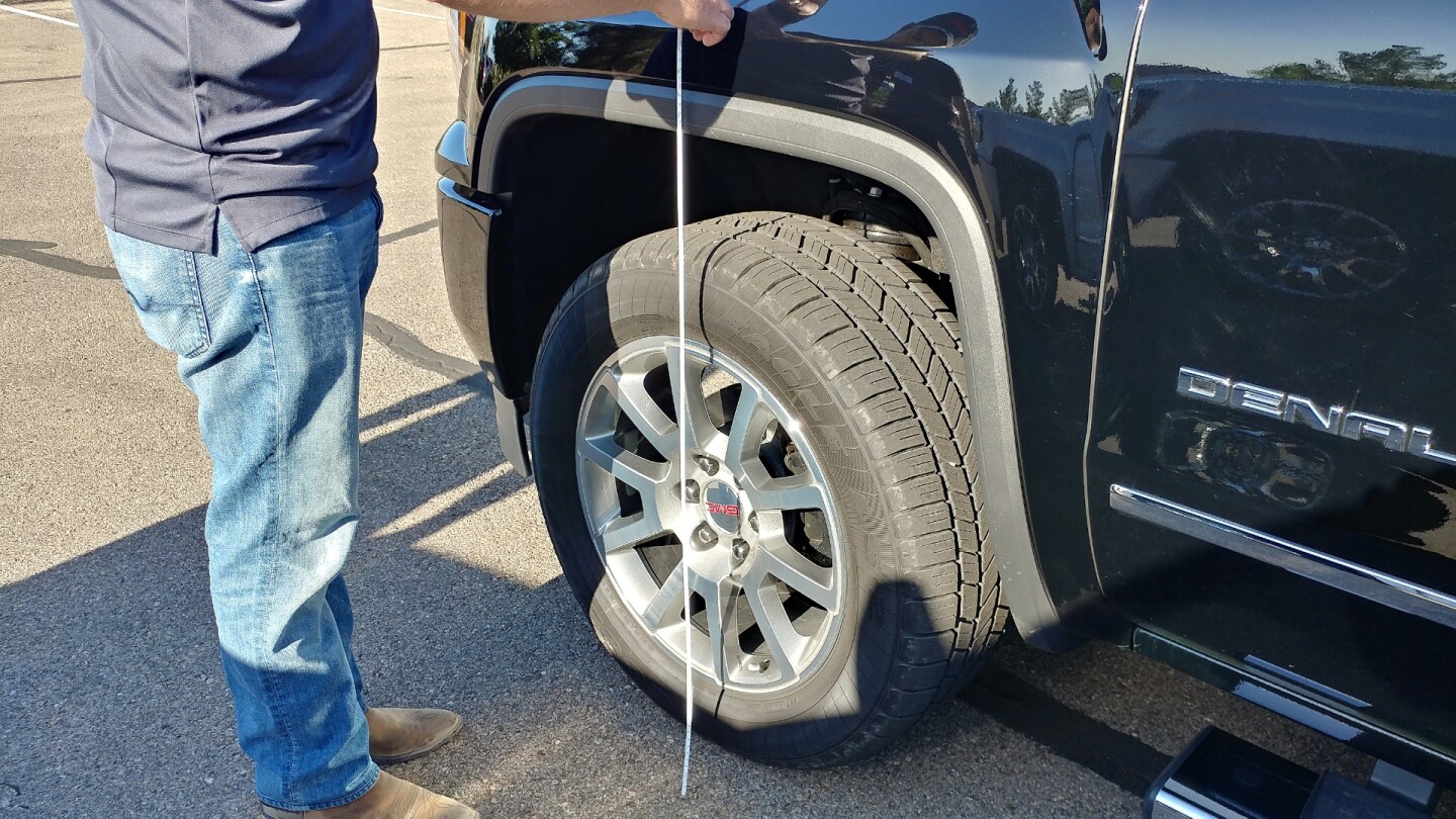 Measuring the change in height of the fender edge can gauge how much weight the trailer is putting on the rear of the truck