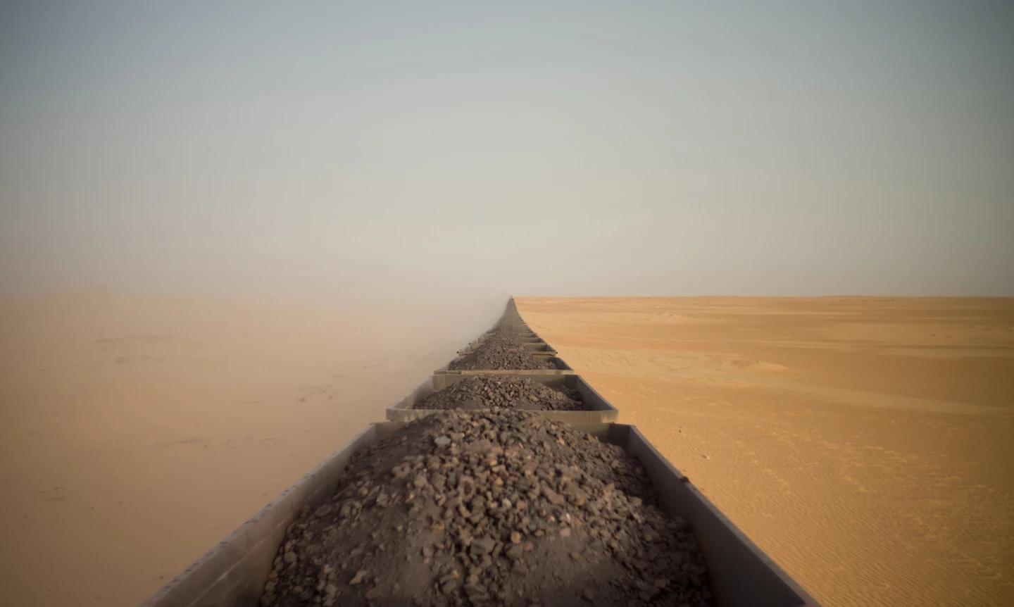 Winner, Travel, Riding a Saharan Freight Train. At 2.5km long, the iron-ore train in Mauritania is one of the longest trains in the world. It covers over 700km on its journey from the coastal town of Nouadhibou to the Saharan wilderness of Zouérat