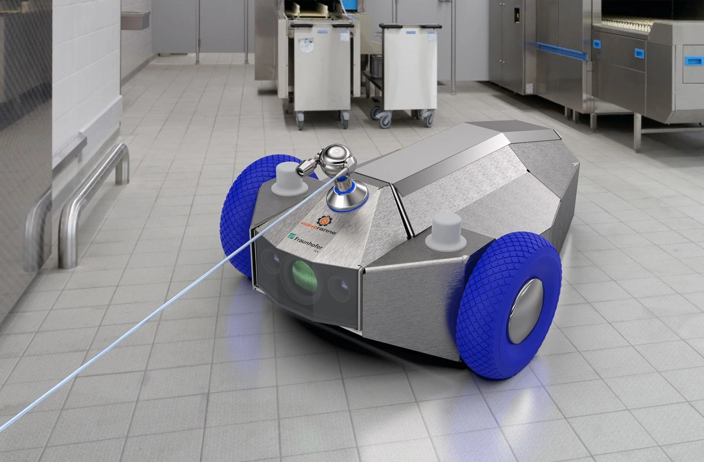 The wheeled version of the robot (pictured here with its arm lowered) is connected to a docking station via a hose
