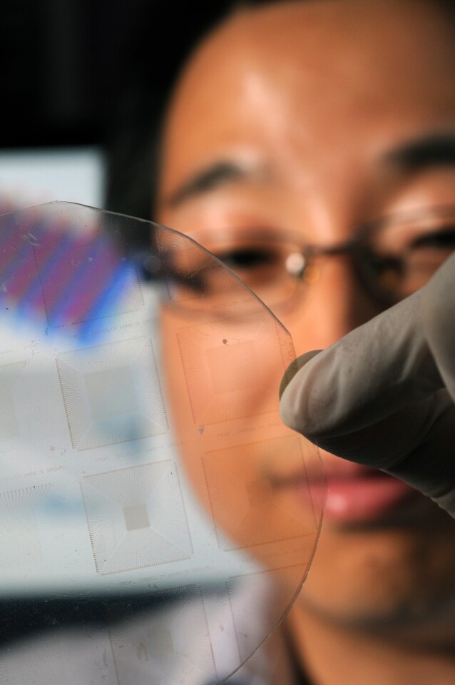 The arrays are transparent, flexible, and quite durable, which opens them up to a wide range of applications, particularly for touchscreens and artificial skin (Photo: Georgia Tech / Gary Meek)