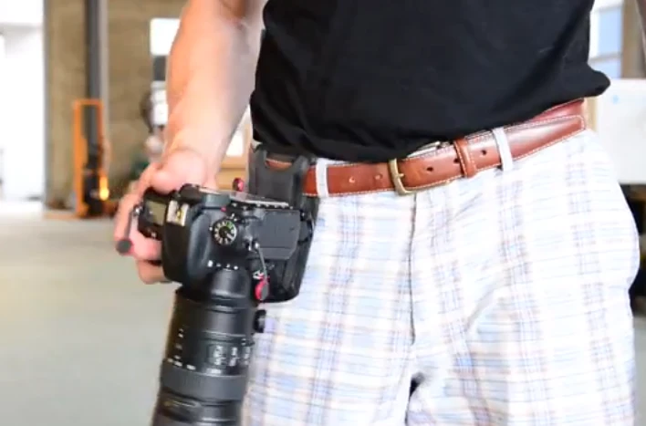 The Capture Camera Clip v2 allows you to clamp your DSLR camera onto your belt buckle