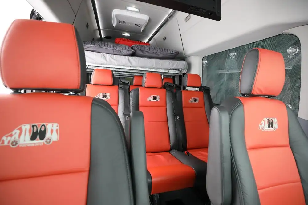 VanDoIt says that you can pull out the camper hardware and drop in seats for up to 11 people inside one of its vans, creating a very versatile camper/people-mover
